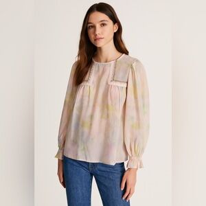 Gorgeous baby doll style blouse.